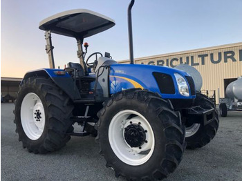 Farm tractor NEW HOLLAND TL100