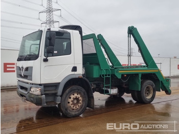 Skip loader truck